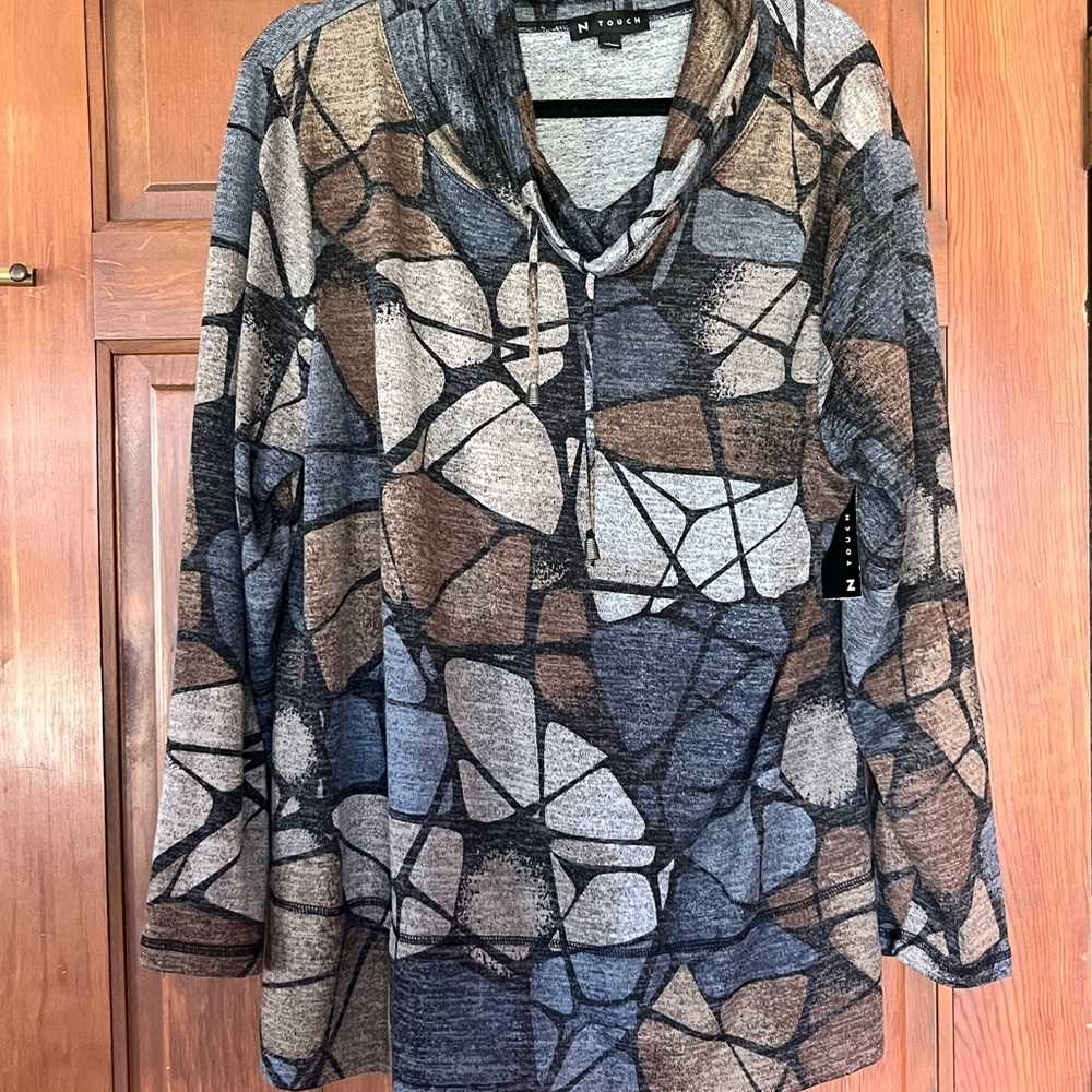Patterned Tunic Top Brand New size Large with cute drawstring accent at neckline